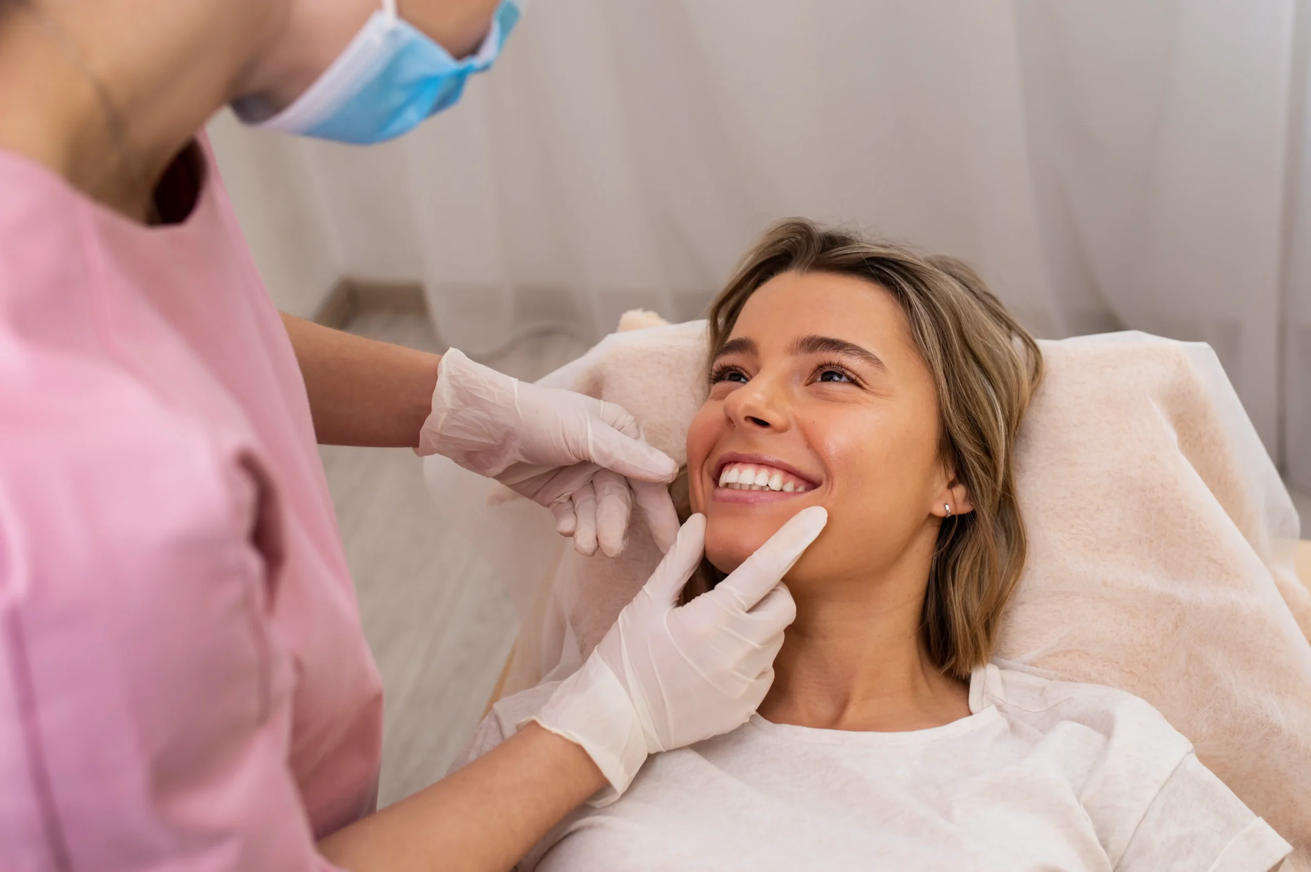 young-man-with-toothy-smile-demonstrating-his-dental-implant (5) (1)